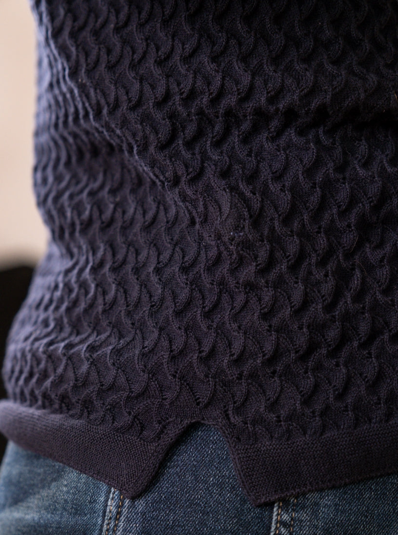 Luxury knit polo shirt with wave-like pointelle stitching – The Sirocco Polo by Iris & Loom